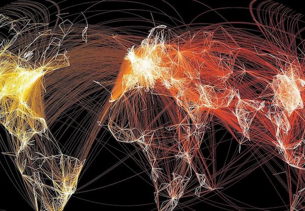 Several glowing lines outline the world map over a black background. 